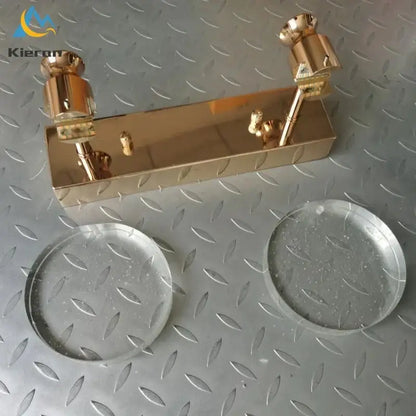 Gold Three Globe Wall Light brass finish with rectangular backplate and two candle sockets on Tampa Home & Garden Store