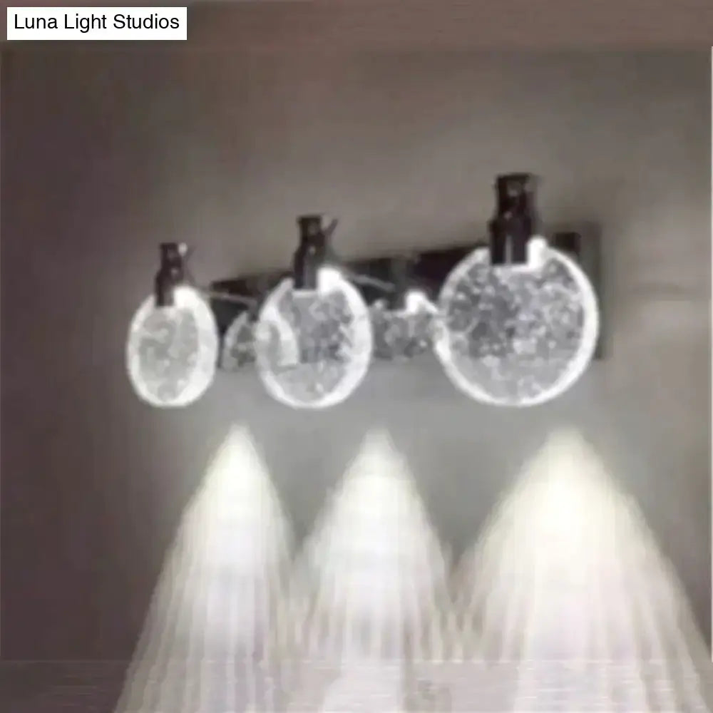 Decorbites gold three-globe wall light with textured crystal glass globes on Tampa Home & Garden Store