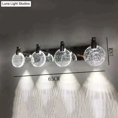 Gold Three Globe Wall Light by Decorbites with five speckled glass globes on chrome bar on Tampa Home & Garden Store