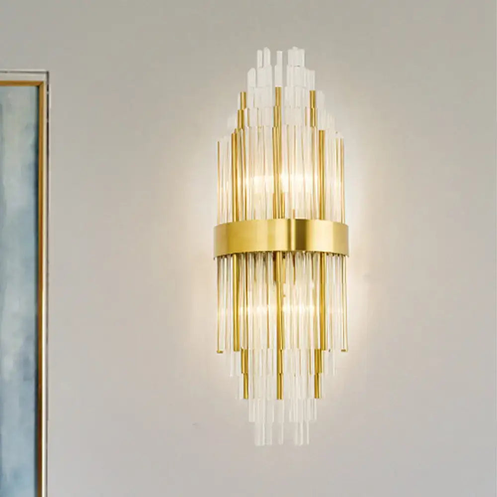 Gold cascading glass sconce by Decorbites with vertical glass rods around a central gold band on Tampa Home & Garden Store