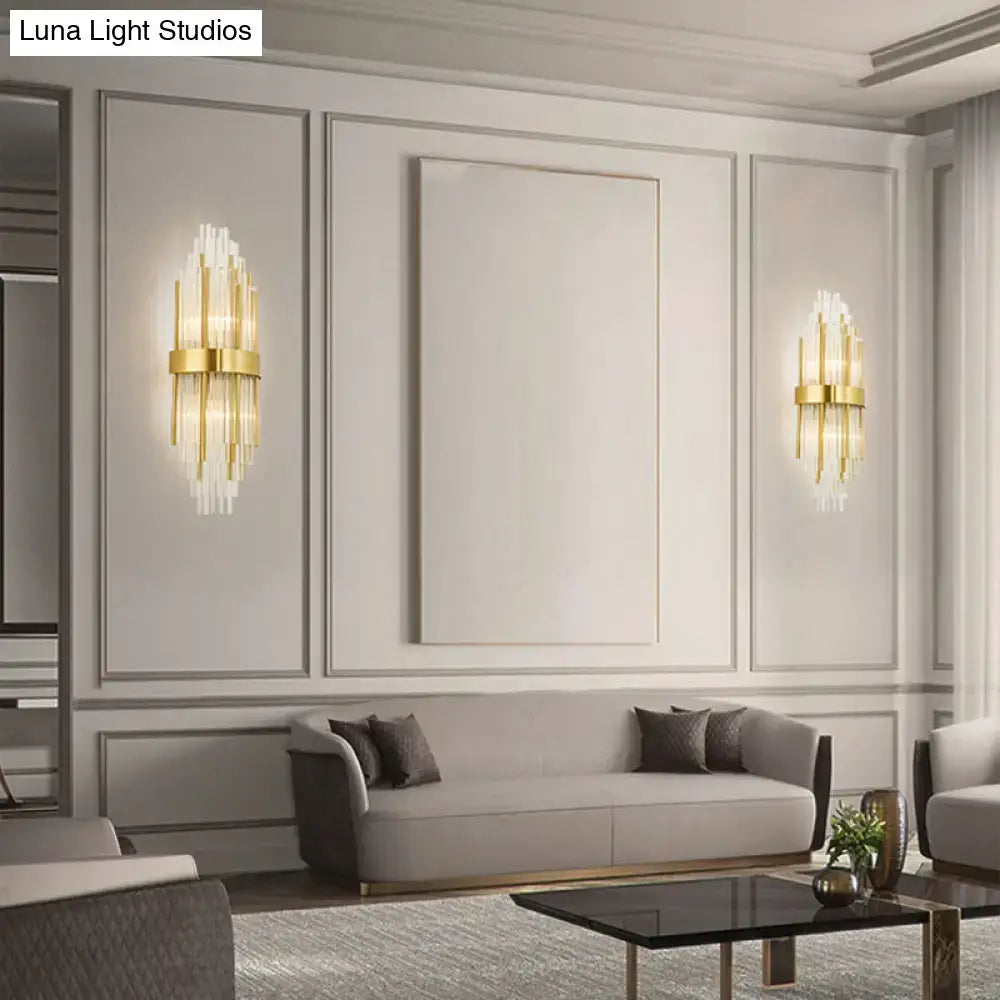 Gold cascading glass sconce pair with vertical glass rods and sleek gold finish on Tampa Home & Garden Store