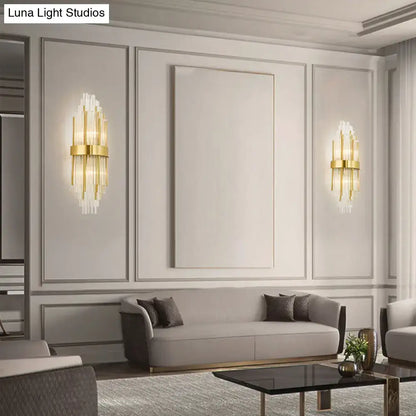Gold cascading glass sconce pair with vertical glass rods and sleek gold finish on Tampa Home & Garden Store