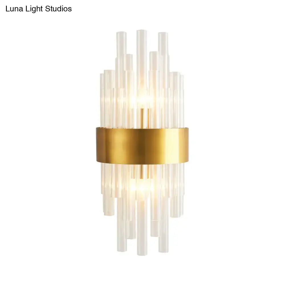 Gold crystal 2-light wall sconce with clear glass rods and a gold band by Decorbites on Tampa Home & Garden Store