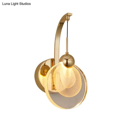 Gold round crystal industrial wall lamp by Decorbites with glass globe and curved arm on Tampa Home & Garden Store