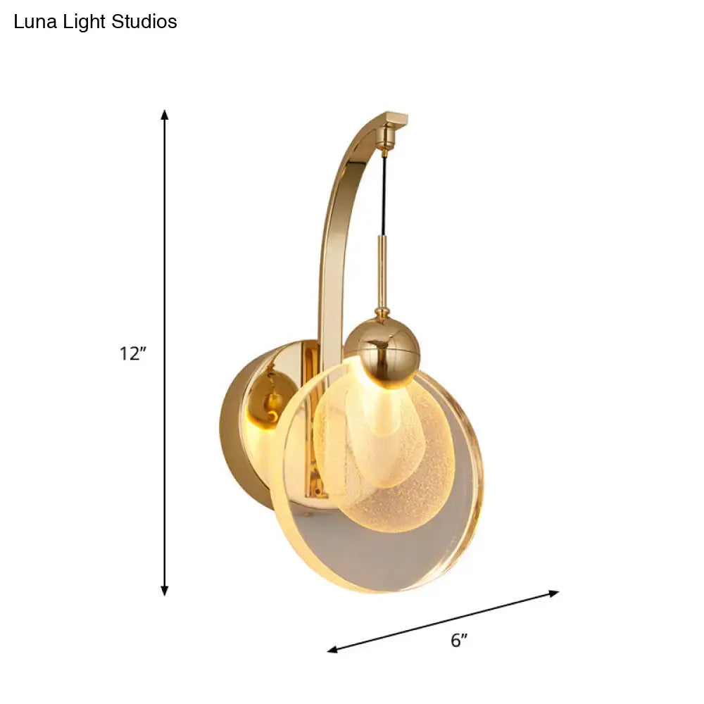 Gold round crystal glass globe wall lamp with curved arm, industrial sconce on Tampa Home & Garden Store
