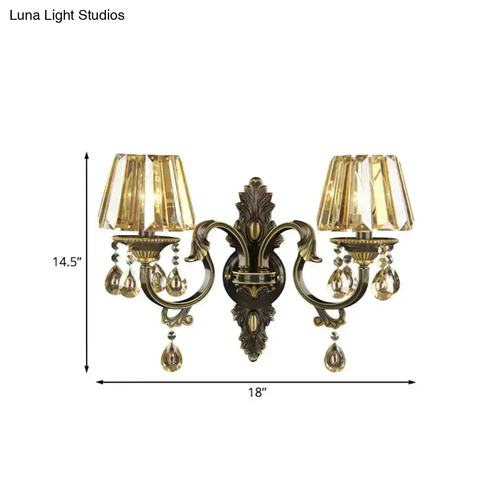 Decorbites gold crystal teardrop dual-arm sconce with amber prisms, 18in wide by 14.5in high on Tampa Home & Garden Store