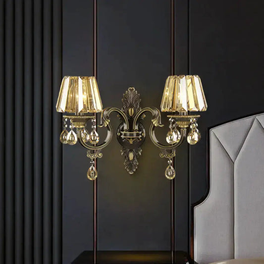 Modern gold crystal teardrop wall sconce set with dual arms and hanging crystals on Tampa Home & Garden Store