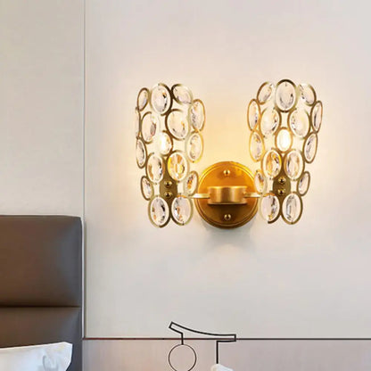 Decorbites gold cascading crystal sconce wall light with circular crystal disks on Tampa Home & Garden Store