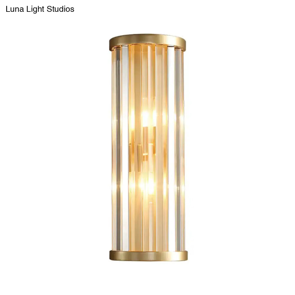 Gold two-light cylindrical crystal wall sconce with clear glass panels by Decorbites on Tampa Home & Garden Store