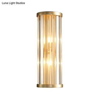 Gold two-light cylindrical crystal wall sconce with clear glass panels by Decorbites on Tampa Home & Garden Store