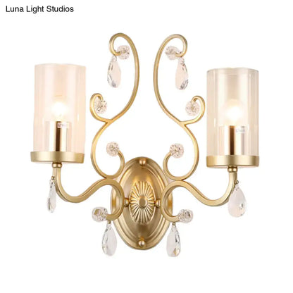 Gold Cylinder Wall Light by Decorbites with dual arms, crystal drops, gold finish on Tampa Home & Garden Store