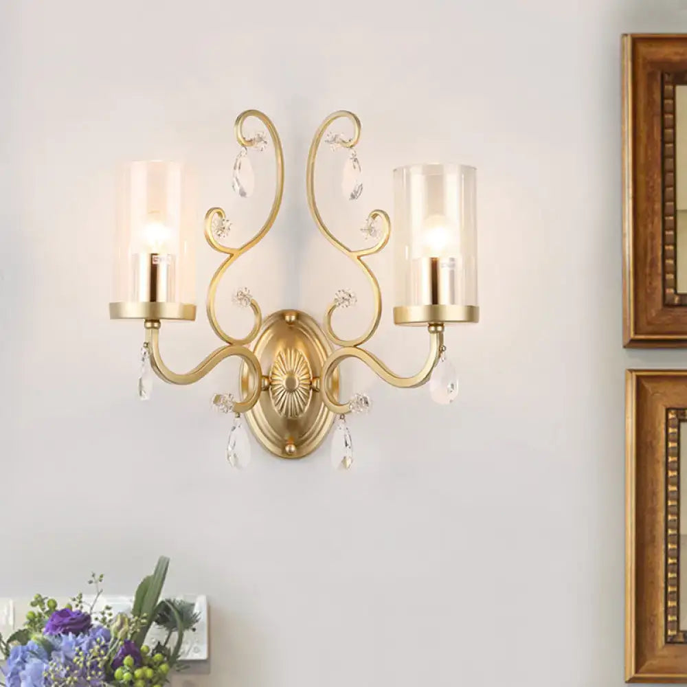 Gold Cylinder Wall Light by Decorbites, gold finish dual-arm sconce with crystal drops on Tampa Home & Garden Store