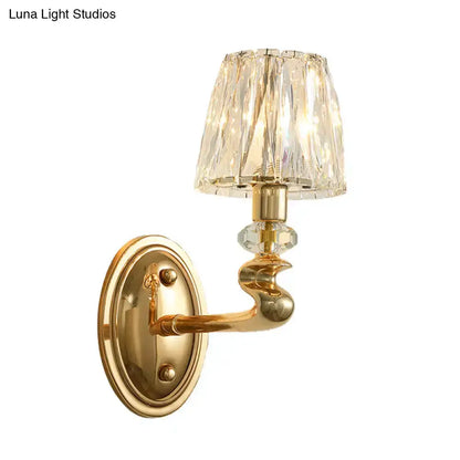 Gold crystal wall sconce with curved arm and crystal shade Decorbites on Tampa Home & Garden Store
