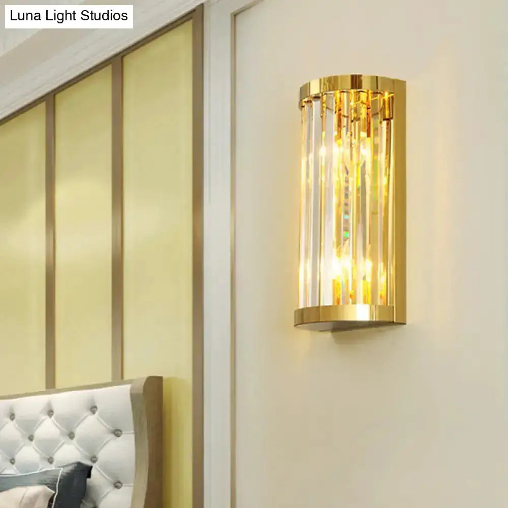 Modern gold crystal wall sconce with vertical prisms; wall-mount bedroom lighting by Decorbites on Tampa Home & Garden Store