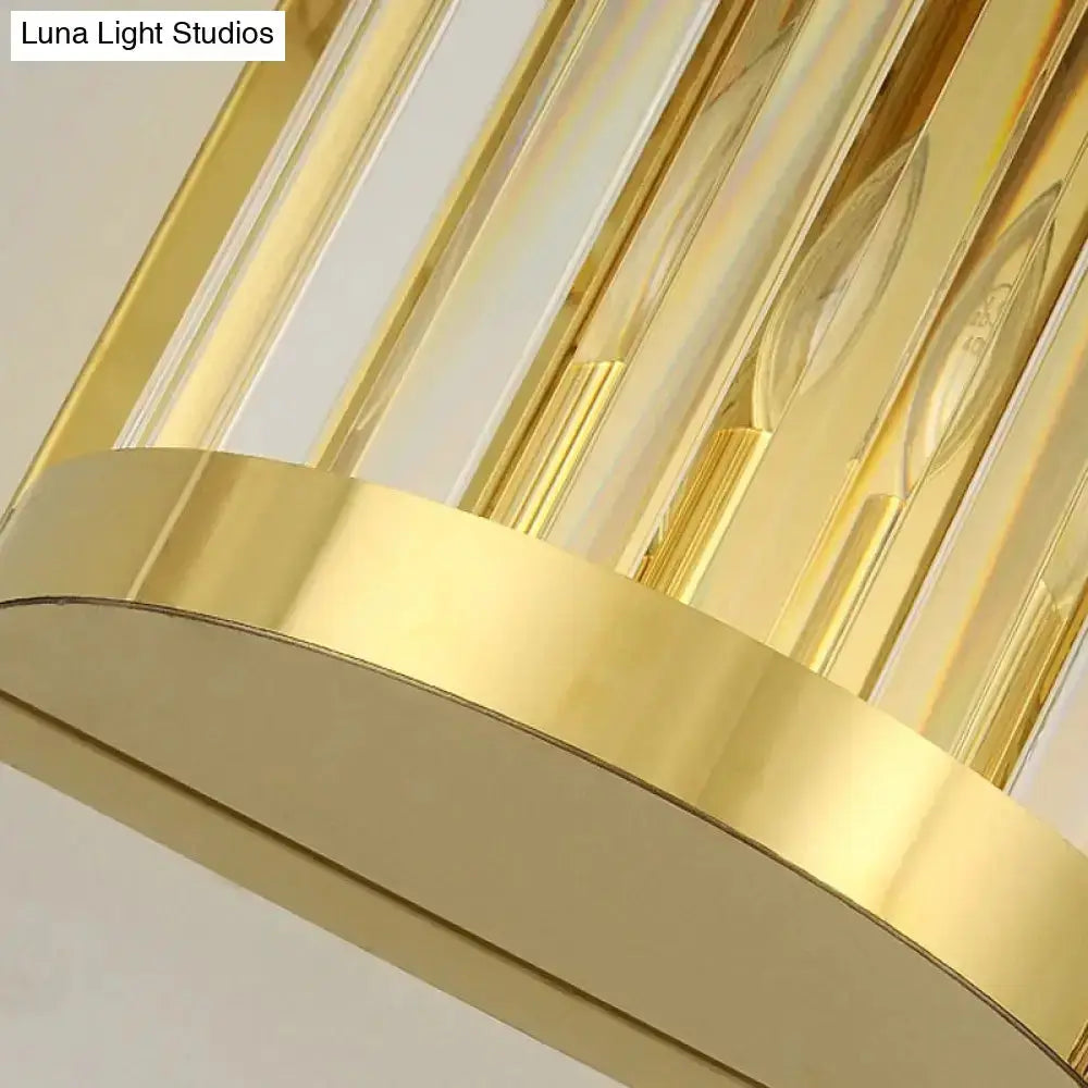 Modern gold crystal wall sconce by Decorbites for bedroom with clear prisms and gold band on Tampa Home & Garden Store