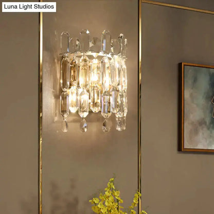 Modern gold crystal wall sconce with hanging prisms by Decorbites on Tampa Home & Garden Store