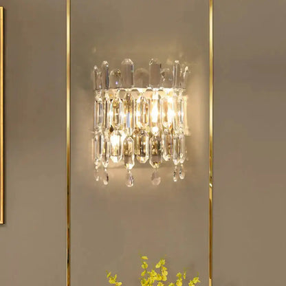Modern gold crystal wall mount lighting sconce by Decorbites with hanging prisms on Tampa Home & Garden Store