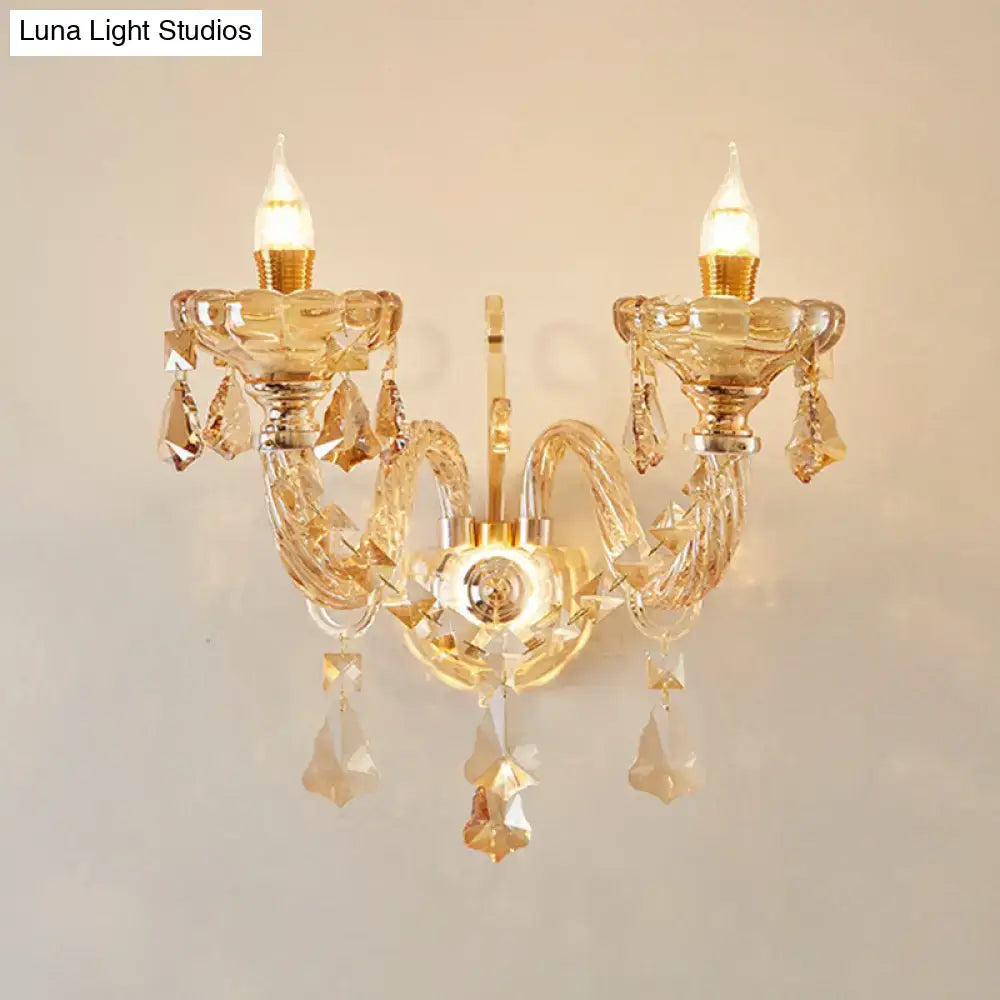 Gold crystal faceted two-head candle sconce by Decorbites with hanging prisms on Tampa Home & Garden Store