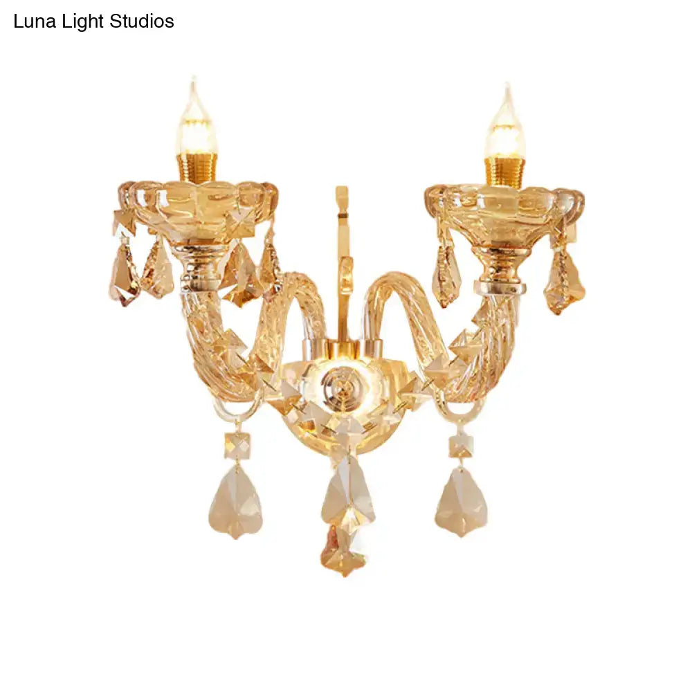 Gold crystal two-head candle sconce by Decorbites with hanging prisms on Tampa Home & Garden Store