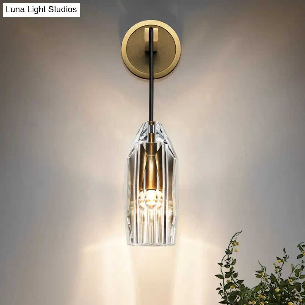 Gold crystal wired sconce by Decorbites with clear glass shade and brass backplate wall-mounted on Tampa Home & Garden Store