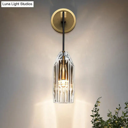 Gold crystal wired sconce by Decorbites with clear glass shade and brass backplate wall-mounted on Tampa Home & Garden Store