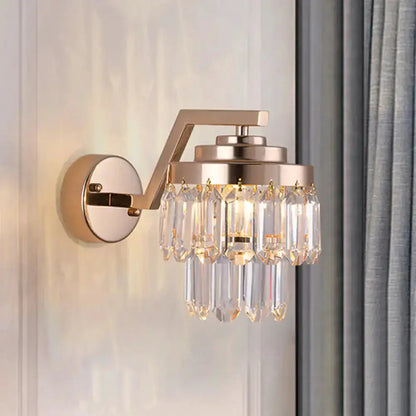 Modern gold crystal wall sconce with hanging prisms and LED lighting by Decorbites on Tampa Home & Garden Store