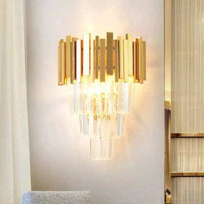 Modern gold crystal wall sconce by Decorbites, gold metal with cascading crystal prisms on Tampa Home & Garden Store