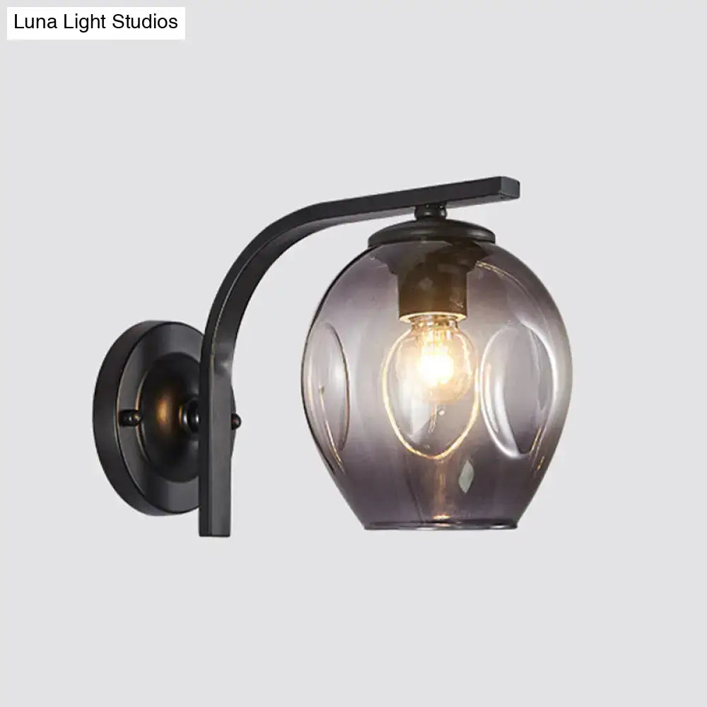 Black curved-arm glass wall sconce with smoky shade, Decorbites lamp Tampa Home & Garden Store on Tampa Home & Garden Store