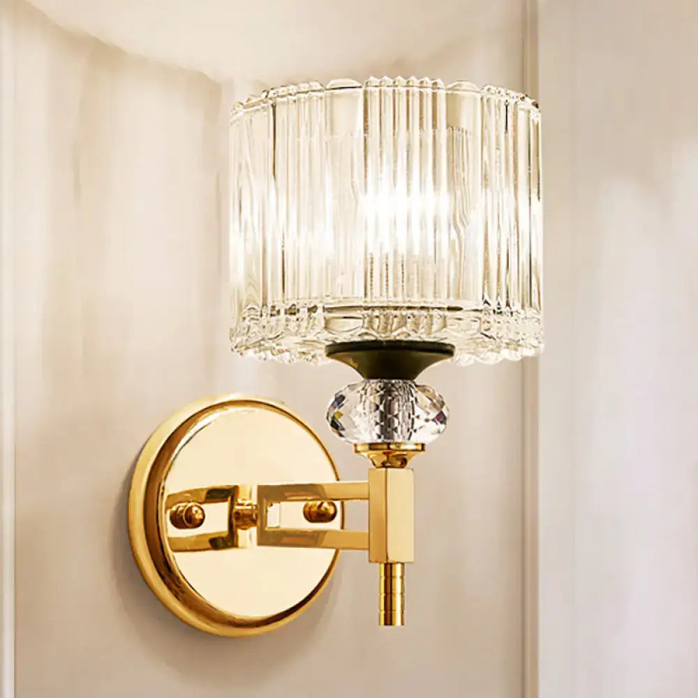 Gold crystal wall lamp sconce with brass mount and crystal shade on Tampa Home & Garden Store