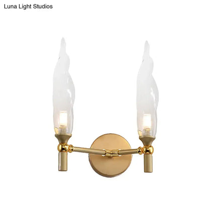 Gold double arm wall sconce by Decorbites, brass finish, dual candle bulbs on Tampa Home & Garden Store