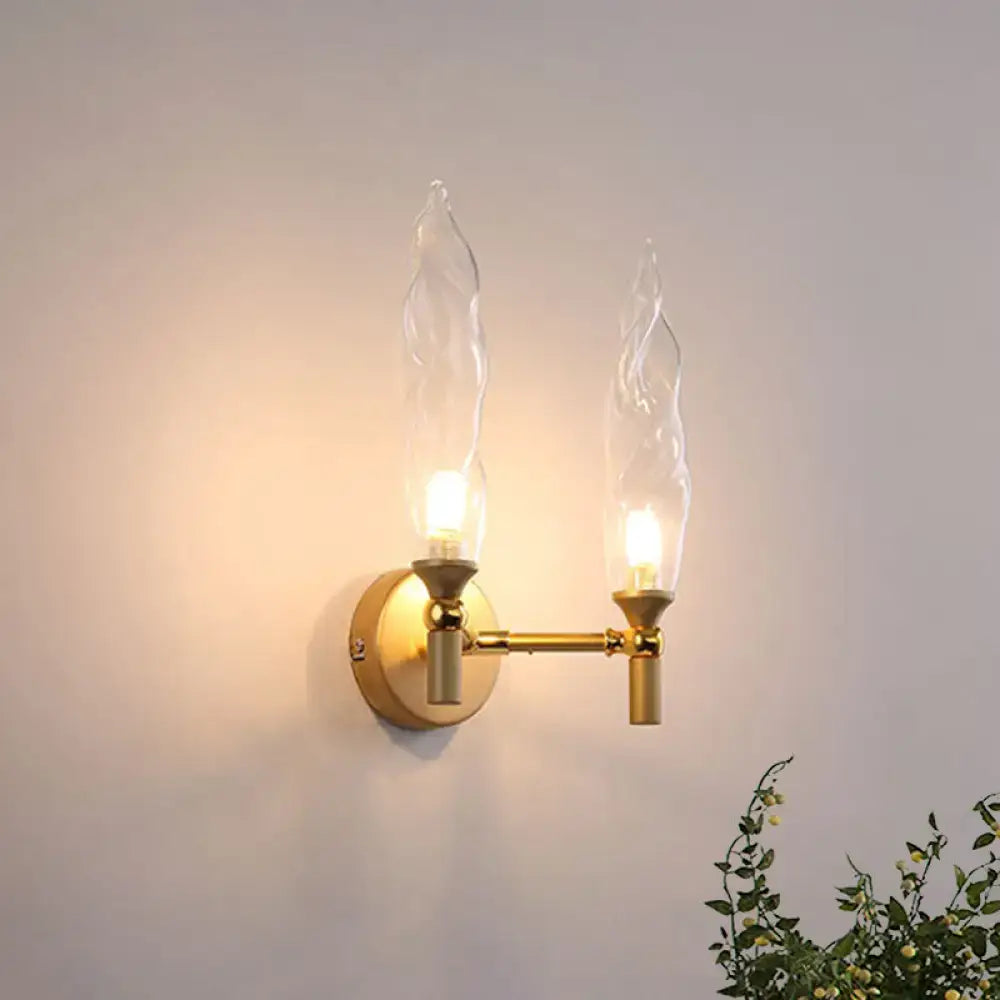 Gold double-arm brass wall sconce with candle bulbs by Decorbites on Tampa Home & Garden Store