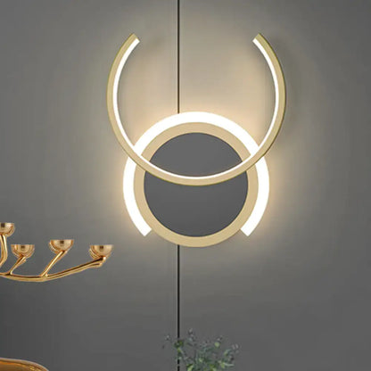 Gold Ring LED Wall Sconce by Decorbites, overlapping circular LED rings on Tampa Home & Garden Store