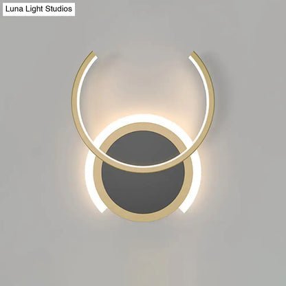 Gold Ring LED Wall Sconce by Decorbites with overlapping circular gold rings and warm backlight on Tampa Home & Garden Store