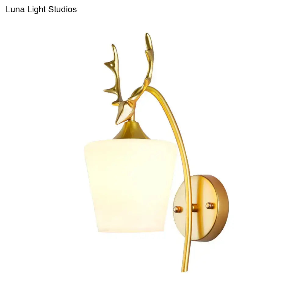 Gold Elk Wall Sconce with elk antler accents, gold finish by Decorbites on Tampa Home & Garden Store