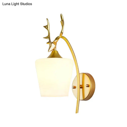 Gold Elk Wall Sconce with elk antler accents, gold finish by Decorbites on Tampa Home & Garden Store