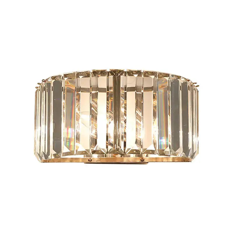 Modern gold faceted crystal wall sconce with vertical prisms for glamorous bedroom lighting on Tampa Home & Garden Store