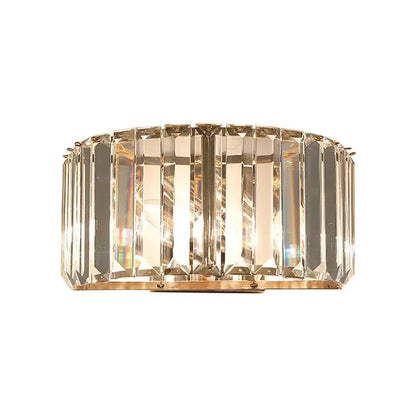 Modern gold faceted crystal wall sconce with vertical prisms for glamorous bedroom lighting on Tampa Home & Garden Store