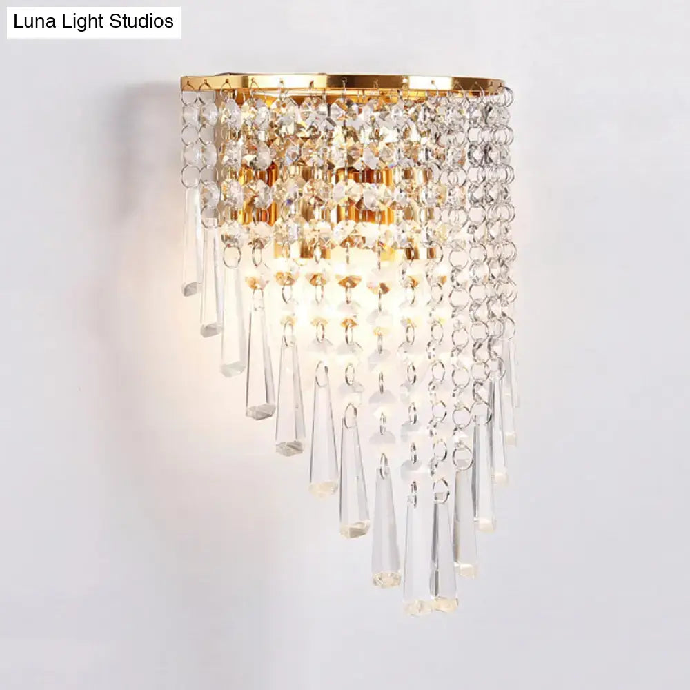 Gold Crystal Two-Bulb Wall Sconce by Decorbites with cascading crystal prisms and a gold finish on Tampa Home & Garden Store