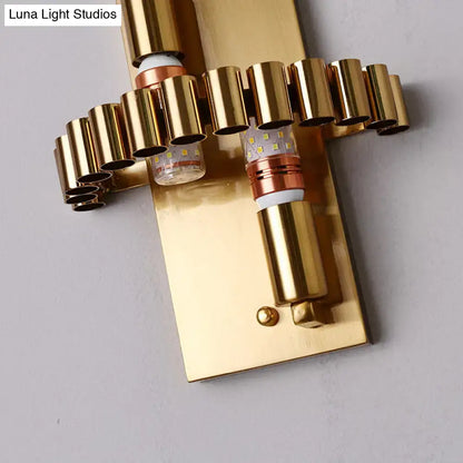 Gold cylinder crystal sconce by Decorbites with brass backplate and LED tube bulbs on Tampa Home & Garden Store