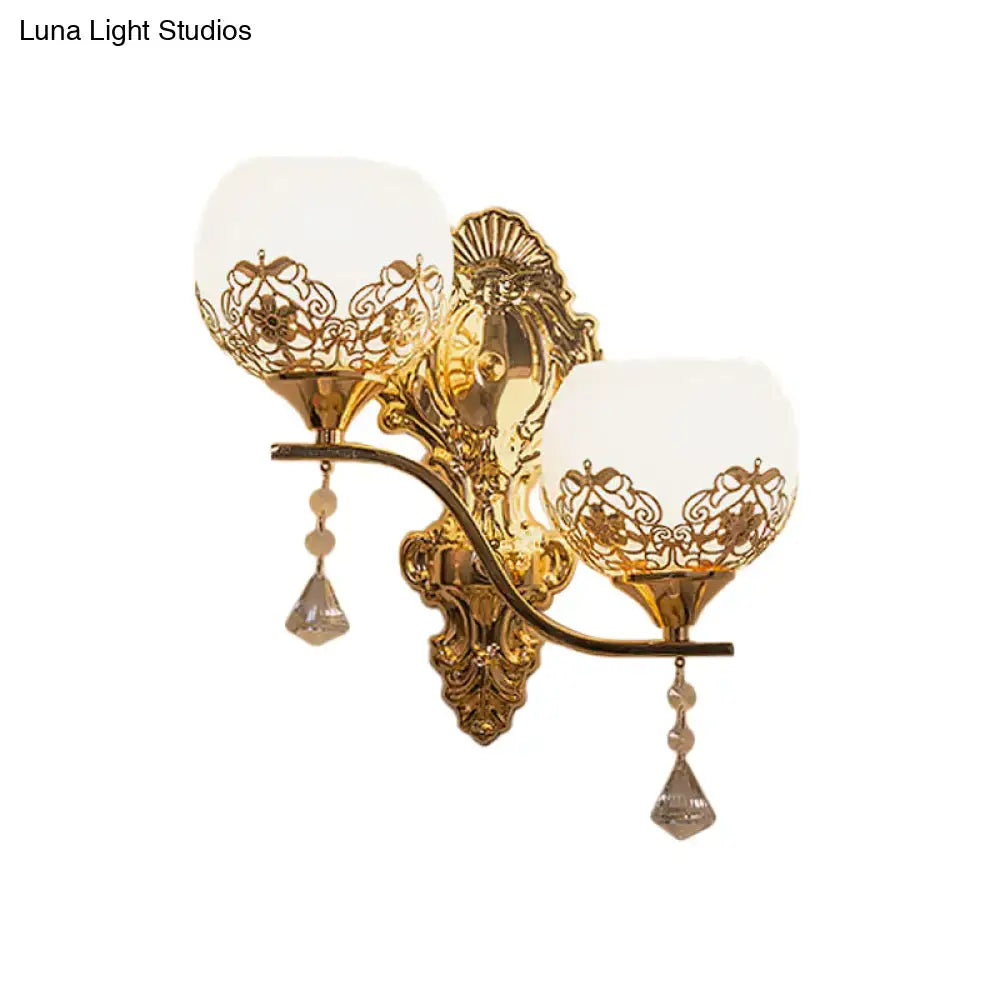 Decorbites Gold Dome Crystal Dual-Bulb Sconce with ornate brass backplate and glass shades on Tampa Home & Garden Store