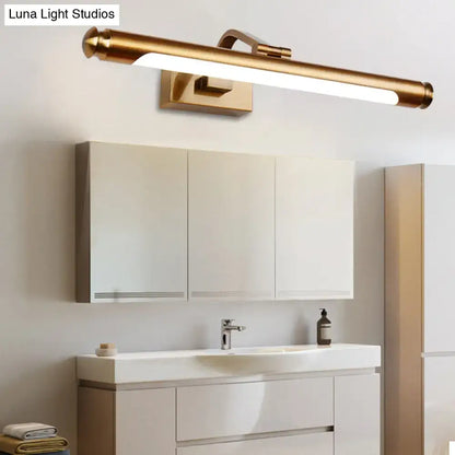 Decorbites gold tubular vanity light with white diffuser above bathroom vanity on Tampa Home & Garden Store