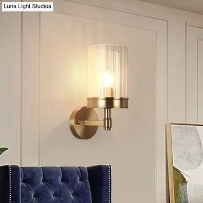 Gold clear glass minimalist hallway sconce by Decorbites with brass backplate on Tampa Home & Garden Store