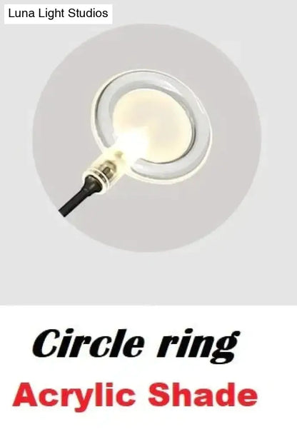 Wall light in gold with circle-ring acrylic shade and LED glow by Luna Light Studios on Tampa Home & Garden Store