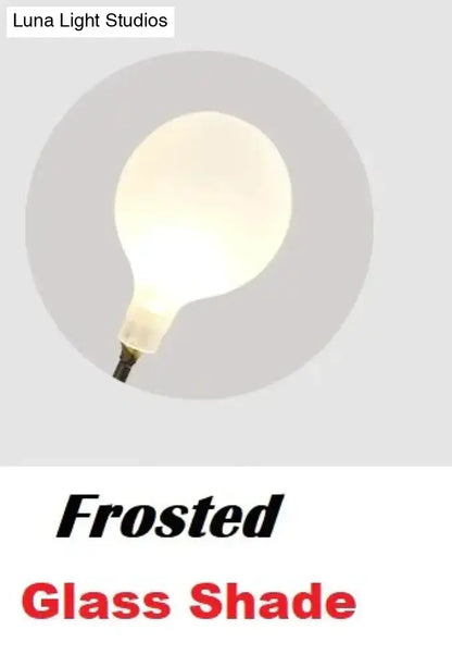 Wall light with frosted glass shade and warm glow bulb by Luna Light Studios on Tampa Home & Garden Store