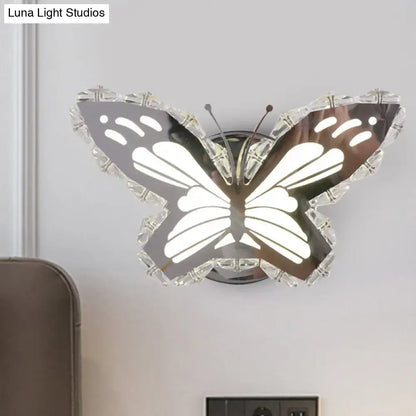 Gold Crystal Fish Wall Sconce and a Led Light