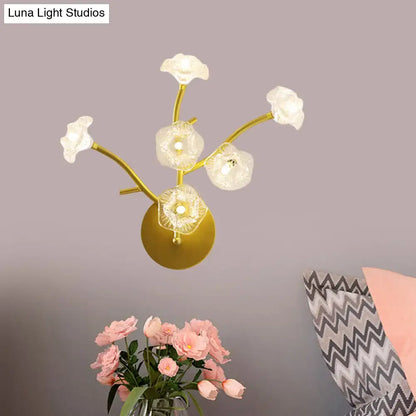 Gold Floral Bedside Sconce with gold-tone branches and clear glass blossom lights Decorbites on Tampa Home & Garden Store