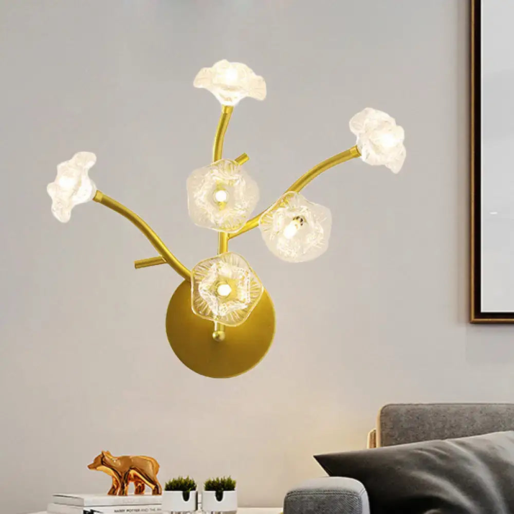 Gold floral bedside sconce with glass flower bulbs on a gold stem and round wall mount on Tampa Home & Garden Store