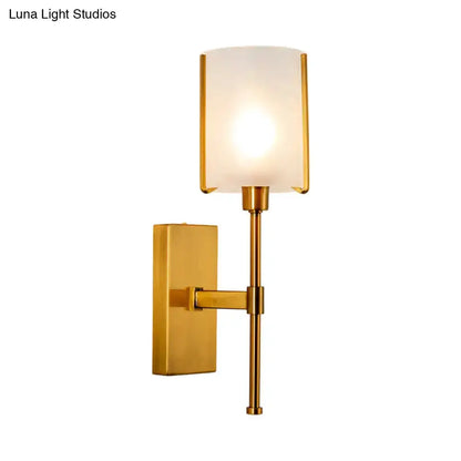 Modern gold frosted glass wall sconce with pencil arm and rectangular backplate by Decorbites on Tampa Home & Garden Store