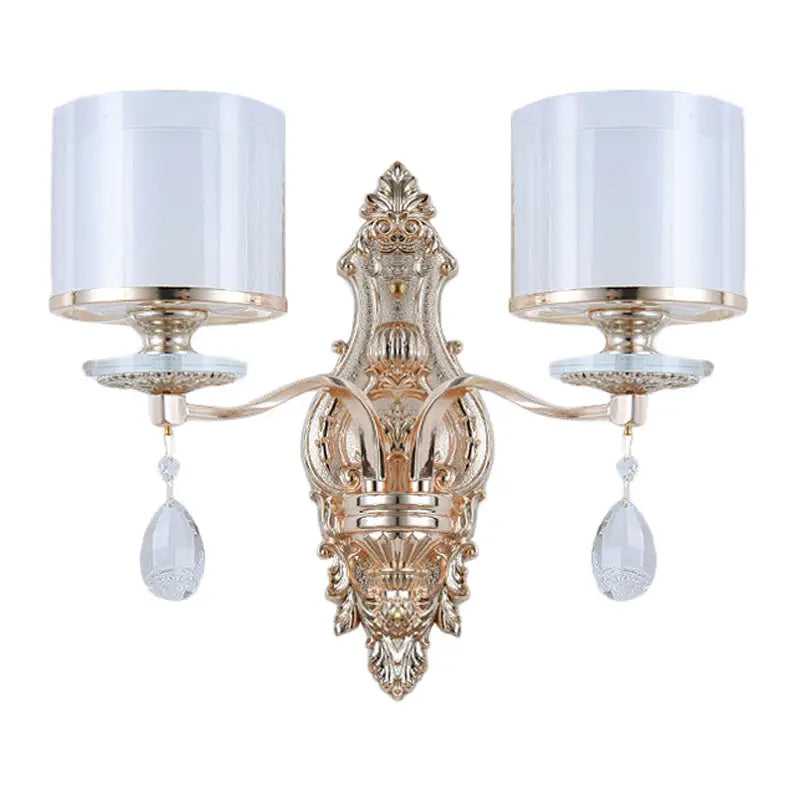 Gold Crystal Double Cylinder Wall Sconce Decorbites with dual arms and white drum shades on Tampa Home & Garden Store