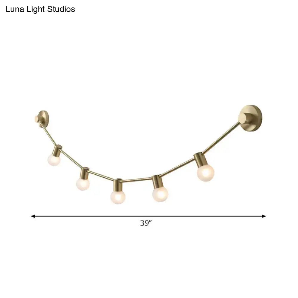 Gold bubble wall light by Decorbites, curved brass string with globe bulbs, 39" length on Tampa Home & Garden Store
